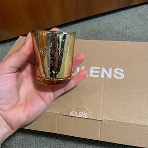 Gold votives for wedding centerpiece.